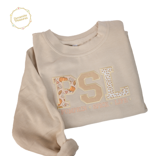 Tan colour sweater with PSL Embroidered on it